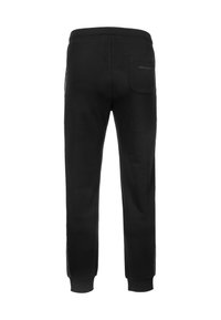 Sorte sweatpants lavet af blødt stof, med en baglomme og elastiske manchetter. Enkel design uden synlige mønstre eller grafik.