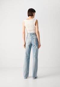 Scotch & Soda THE GLOW - Jeans bootcut - art from the heart