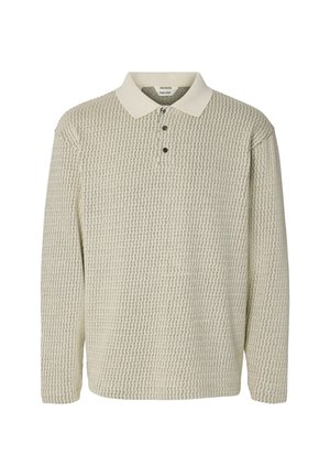 Beige long-sleeve polo shirt with a cream collar and a small repeating geometric pattern, featuring three dark buttons at the neckline.