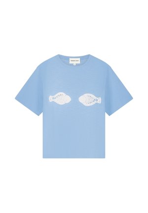Light blue short-sleeve t-shirt with two white fish-shaped cutout patterns centered on the chest.