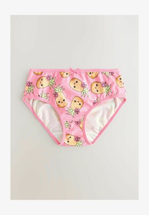 Pink cotton underwear featuring a repeating pineapple print with faces and flowers. The waistband has a small bow accent.