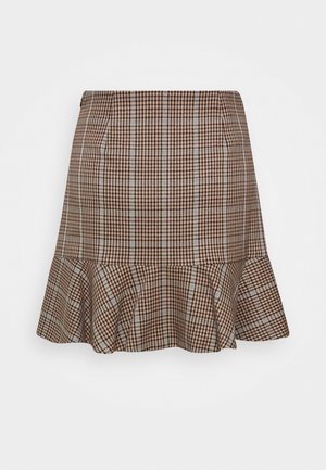 Bruine en blauwe geruite rok met een gerimpelde rand, gemaakt van een zachte stof. Heeft twee zijzakken en een aangesloten tailleband.