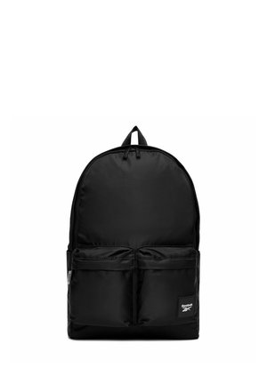 Zaino nero Reebok con due tasche frontali con cerniera e anello superiore per la maniglia, esposto su sfondo bianco.