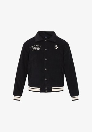 Marineblauwe corduroy jas met een knoopsluiting, witte ankerborduursel en gestreepte geribbelde mouwen en zoom. Beschikt over een klassiek kraagontwerp.