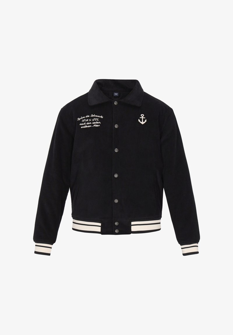 Marineblå kordfløjljakke med knapåbning, hvidt ankerbroderi og stribede ribkanter og nederdel. Har et klassisk kravedesign.