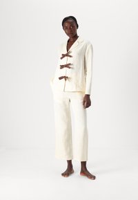 Sleeper CRUSOE  - Pyjama - white asparagus