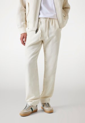 Guess Kelnės - creme