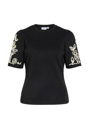 Melna īsroku krekls ar uzpūstām piedurknēm un baltu ziedu izšuvumu uz abām piedurknēm, apaļa kakla izgriezums, pieguloša vidukļa daļa.