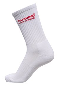 Biała skarpetka sportowa wykonana z mieszanki bawełny, charakteryzująca się żebrowaną teksturą oraz nadrukowanym na mankiecie czerwonym logo "hummel".