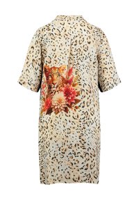 Camicia a fantasia leopardata in beige, con un dettagli grafico floreale e leopardato colorato sulla schiena, con maniche corte e una vestibilità rilassata.