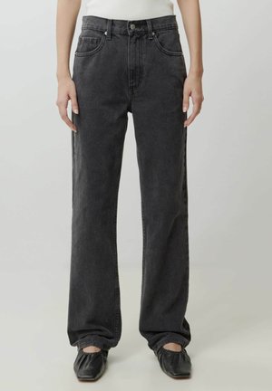 CARO - Bootcut jeans - schwarz