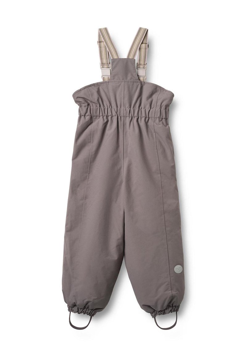 Harmaat vedenpitävät haalari, jossa on joustava vyötärö, säädettävät raidalliset olkaimet ja joustavat hihansuut. Housunlahkeessa on pyöreä logo.