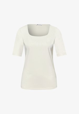 Camiseta blanca lisa de manga corta para mujer, con un amplio escote cuadrado y una etiqueta en el interior del cuello que dice "Street One".