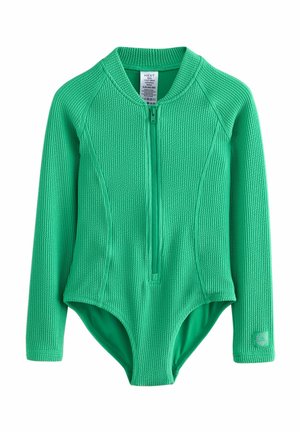 Grøn langærmet bodysuit lavet af tekstureret stof, med en frontlynlås og en rund halsudskæring, samt et logo-patch på venstre ærme.