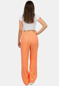 Reichstadt Broek - orange