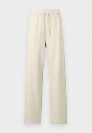 Beige wide-leg sweatpants with ribbed drawstring waistband and subtle logo on right thigh, displayed on a plain background.