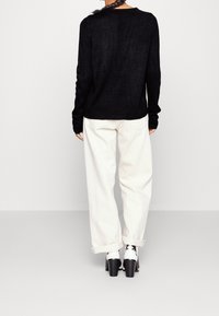 ONLY Petite Stickad tröja - black