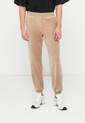 TRACK PANTS UNISEX - Tracksuit bottoms - beige