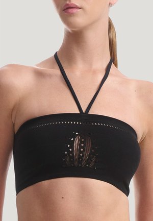 Top bandeau nero con sottili spalline a halter, caratterizzato da dettagli in rete con tagli sulla parte anteriore, realizzato in un tessuto liscio e elasticizzato.