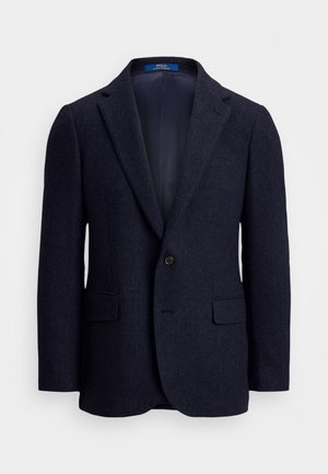 Navy blue herringbone wool blazer with notch lapels, single-button closure, flap pockets, and dark inner lining.
