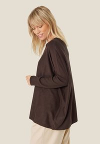 Masai Maglione - coffee bean