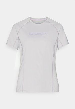 Gaiši pelēks īsām piedurknēm krekls ar apaļu izgriezumu, ar violetiem akcentiem un 'MAMMUT' logotipu uz priekšpuses. Mīksta, gluda auduma.