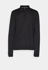 Polo noir à manches longues avec trois boutons et bord-côtes aux poignets et à l'ourlet, présenté sur un fond gris neutre.