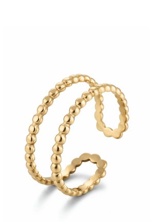 Anillo de doble espiral de color dorado con textura de cuentas que forman dos bandas abiertas sobre un fondo blanco.