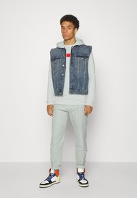 HUGO DARATSCHI - Sweatshirt com capuz - light pastel green