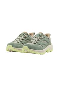 Green suede and mesh sneakers with cream accents, textured laces, and a light green rubber outsole featuring rugged tread for traction.