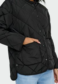 ONLY ONLALTHEA QUILTED - Overgangsjakke - black
