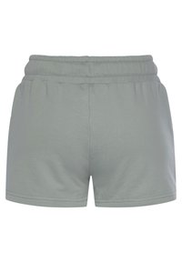 Ljust grå shorts med elastisk midja, minimal sömnad och en slät yta. Utformade med sidoventiler för ökad rörelsefrihet.