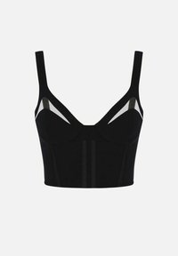 Crop top noir avec des fines bretelles, présentant des panneaux en maille transparente et des bonnets structurés. Fabriqué en tissu lisse avec des détails de couture verticales.