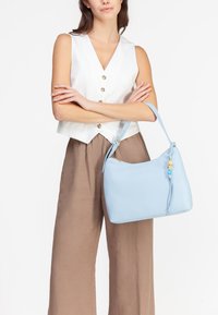Miriade Borsa a mano - azzurro