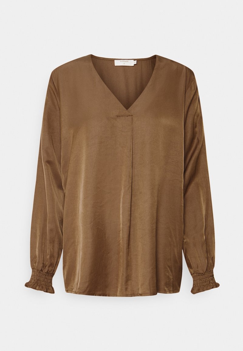 Brązowa bluzka z długim rękawem, dekoltem w serek i marszczonymi mankietami, wykonana z gładkiej, lekko błyszczącej tkaniny.
