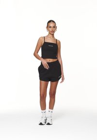 Pegador WILUNA HIGH WAISTED - Treniņtērpa apakšdaļas - black/white