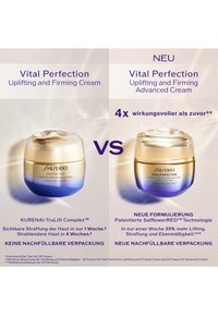 Shiseido Vital Perfection Cremetiegel mit goldenem und blauem Farbverlauf. Links: Straffende und festigende Creme. Rechts: Advanced Cream mit neuer Formel.