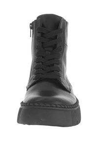Botte en cuir noir à cheville avec un bout rond, un laçage à l'avant et une fermeture éclair sur le côté, dotée d'une semelle en caoutchouc texturé et de détails cousus.
