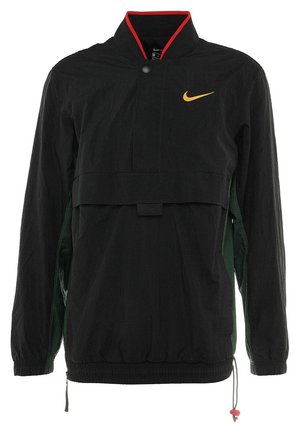 Coupe-vent noir Nike à enfiler avec bordure de col rouge, logo swoosh jaune sur la poitrine, bouton-pression à l'avant, poignets et ourlet élastiques.