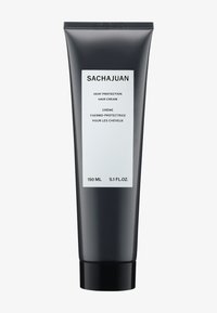 Svart klemrør med matt overflate. Hvit etikett med produktnavn, volum og tospråklig tekst. Inneholder 150 mL med varmebeskyttelseskrem.