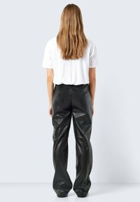 Noisy May Calças de couro - schwarz