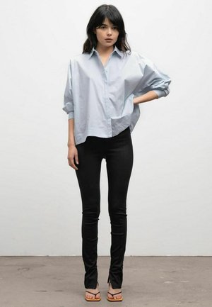 ELLY - Leggings - Trousers - black