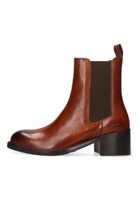 Bota de piel marrón para el tobillo con punta redondeada, paneles laterales elásticos, lengüeta y tacón apilado. Textura lisa con detalles mínimos.