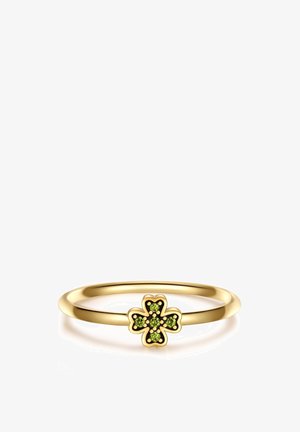 Anello in oro con un design floreale e cinque accenti di pietre verdi al centro. La fascia è liscia e di forma rotonda.