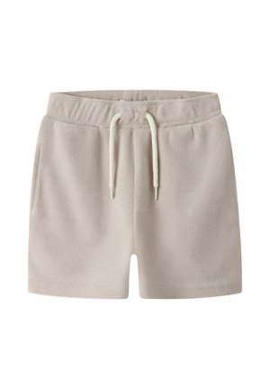 Lys beige frottéshorts med elastisk linning og hvit snor, med sidelommer og avslappet passform.