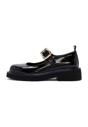 Black patent leather Mary Jane shoes with a rounded toe, buckled strap, and chunky black sole. Features shiny texture and prominent buckle detail.