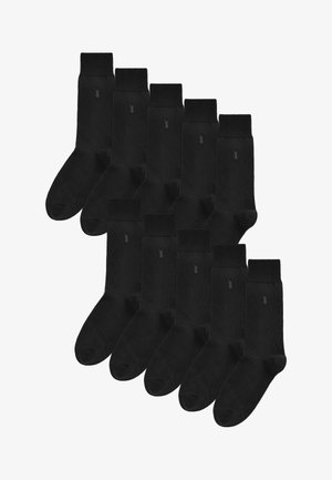 Zwarte katoenen crew-sokken met ribbelmanchetten; elke sok heeft een klein logo. De verpakking bevat twaalf paren, gerangschikt in een gegroepeerde indeling.