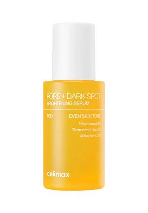 Bottiglia di colore giallo brillante del Celimax Pore + Dark Spot Brightening Serum con tappo bianco e testo che elenca gli ingredienti attivi e i benefici per il tono della pelle.
