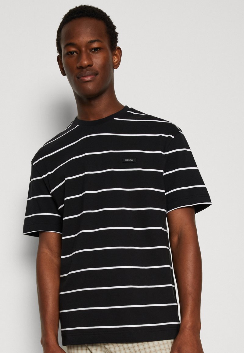 calvin klein black and white striped shirt