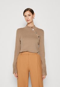 Morgan Maglione - taupe type